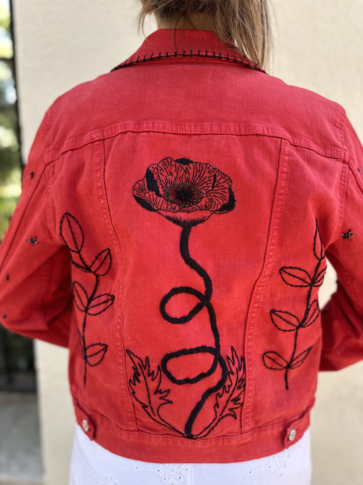 Red jacket with black flowers | Sandra Embroidery Art